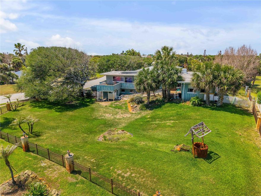 BEACHSIDE OPPORTUNITY - DIAMOND IN THE ROUGH | CASH ONLY Located in the highly desirable beachside community of Daytona Beach, just steps from the Atlantic Ocean, this 2-story 3BR/2BA home offers exceptional potential for renovation or investment. Situated north of Seabreeze Blvd on a quiet residential street, the property is close to beach access, local dining, shopping, and everyday conveniences, offering the best of coastal living. Full of classic 1970s character and charm, the home features a spacious layout, abundant natural light, and strong indoor-outdoor potential. The interior showcases original hardwood flooring throughout, adding warmth and timeless appeal. A spiral concrete staircase connects the upstairs level directly to the garage, a unique architectural feature rarely found in beachside homes. Enjoy outdoor living with a large walkout upper deck overlooking the yard and mature trees, creating a private, peaceful setting. The master bedroom offers ocean views, enhancing the coastal lifestyle experience. Several windows have already been replaced, further improving light, efficiency, and comfort throughout the home. Conveniently located near Seabreeze High School, the Peggy Schnebly Recreation Center, and just a short distance to the beach, this home sits in one of Daytona Beach's most established and desirable coastal neighborhoods.

PROPERTY HIGHLIGHTS & UPDATES:
Roof replaced in 2019
(2) A/C units: main approx. 2018, secondary 2021
Downstairs water heater approx. 6-7 years old
Upstairs shower water heater not operational
Partial plumbing updates completed in 2022 (under home)
Well irrigation system + city water and sewer
Survey on file
Solar panels installed (assumable financing in place)
Low FPL electric approx. $35/month
Multiple windows already updated

ADDITIONAL INFORMATION:
Cash only - no financing available
Sold strictly as-is
Appointment only - no trespassing

A true diamond in the rough, this property offers a rare opportunity in a prime beachside location with strong long-term upside potential for investors, renovators, or end users looking to create their ideal coastal home. CONCRETE BLOCK CONSTRUCTION UNDERNEATH WOOD SIDING. By appointment only.