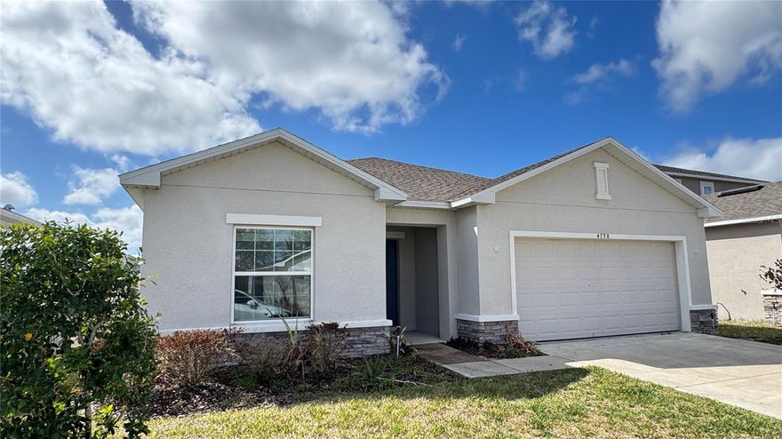 Move-in Special: Tenant who moves in on or before March 31 will receive a one-time $300 move-in credit.
Beautiful 4BR / 2BA Home in Desirable Tierra Del Sol – Move-in Special! Just a few miles west of Disney off Hwy 27 between Hwy 192 and I-4.
This home features an open-concept layout with spacious living, dining, and kitchen areas. The modern kitchen offers quartz countertops, stainless steel appliances, a large island with a breakfast bar, and a walk-in pantry, along with light contemporary cabinetry. Tile flooring runs throughout the main living areas. The primary suite includes a walk-in closet and a private bathroom with dual sinks and a separate toilet room. A split floor plan provides added privacy, with three additional bedrooms and a full bath located on the opposite side of the home. Enjoy the covered back lanai, perfect for relaxing or entertaining. Tierra Del Sol offers a community pool and playground, and the location is extremely convenient with a brand-new Publix next door and the Posner Park shopping center just minutes away, plus easy access to restaurants, entertainment, and theme parks.