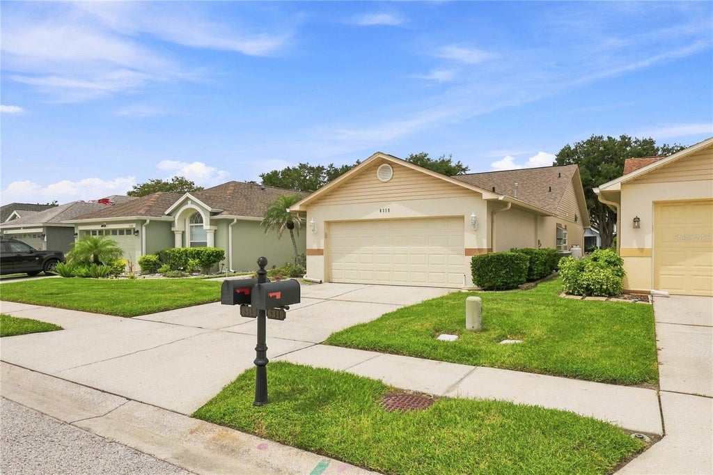 Photo of 6315 Gentle Ben Circle, Wesley Chapel, FL 33544 (MLS # TB8543095)