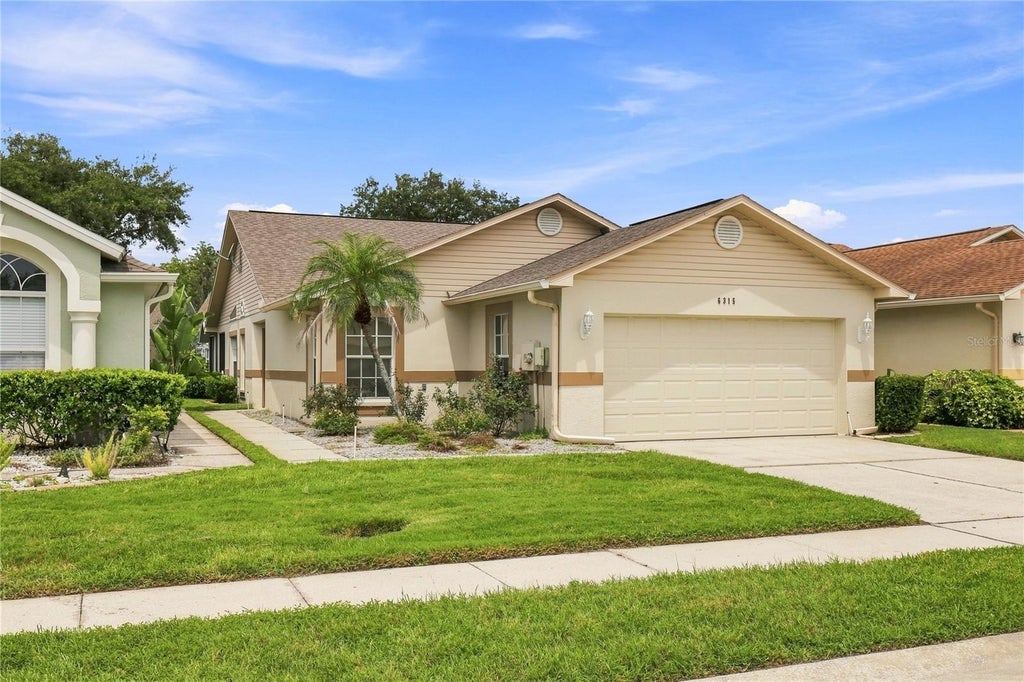 Photo of 6315 Gentle Ben Circle, Wesley Chapel, FL 33544 (MLS # TB8543095)