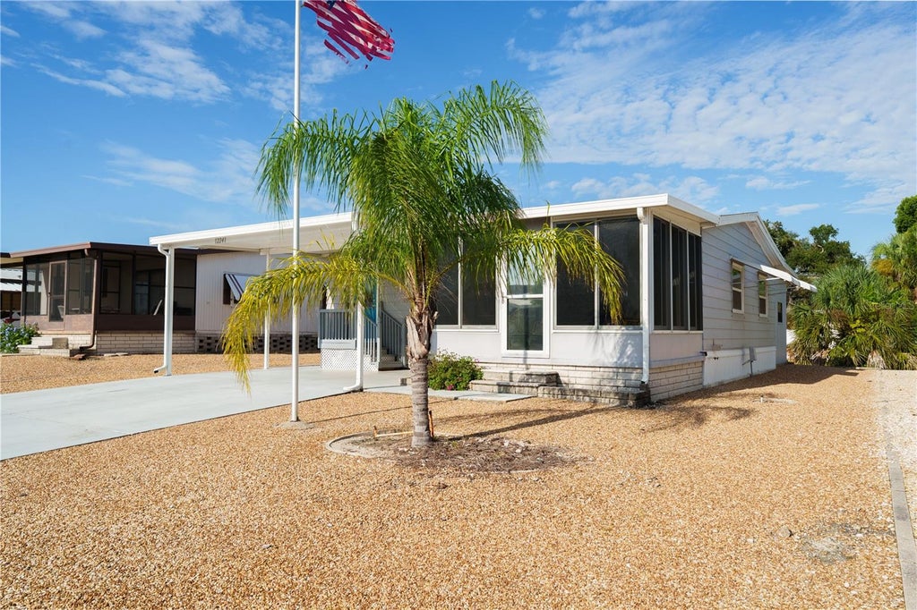 Photo of 12241 Pawnee Drive, Hudson, FL 34667 (MLS # TB8551187)