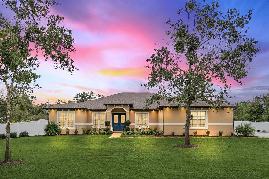 Better than new with all the upgrades!  Perfectly placed on 1.24 HIGH and DRY acres, this 4/3 plus office home has all the upgrades!  Entering through the double doors, you're greeted with vaulted ceilings and a bright and open floor plan!  To the left, there is a designated formal dining area or keep it as a sitting area/reading nook.  To your right, a large 14'x12' office or formal living room.  You're going to love this kitchen!  Equipped with built-in double ovens, stainless steel appliances, a large bar with seating, a 3.5'x7' walk-in pantry, and SO. MANY. CABINETS!!  A dinette sits off of the kitchen is large enough to be your dining room, and is a great feature to expand your entertaining space!  The Primary Suite is abundant in space, including a private entrance, a spacious bathroom with a double-sink vanity and sitting area, garden tub, and an oversized walk-in shower with double shower heads!   The walk-in closet is sure to impress measuring 7'x14'!  Two secondary bedrooms are separated by a bathroom with shower/tub combo.  Bedroom 4 is larger and can be used as a mother-in-law area or guest suite with a private bathroom or pool bath!  The three-panel slider in your living room, the pool bath, and the primary suite all open to your oversized, screened lanai!  Relax in the jacuzzi while you watch the nature in your backyard!  The fenced backyard is BBQ ready and upgraded with sod and a firepit.    Additional upgrades include a Reverse Osmosis system, exterior lighting, an irrigation system, and gutters all around!  There's nothing left to do but grab the keys and enjoy your new home!