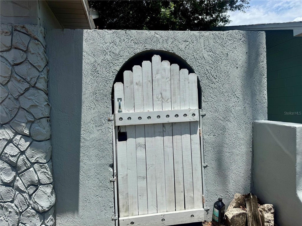 Photo of 5521 Axiom Avenue, Orlando, FL 32839 (MLS # O6418161)