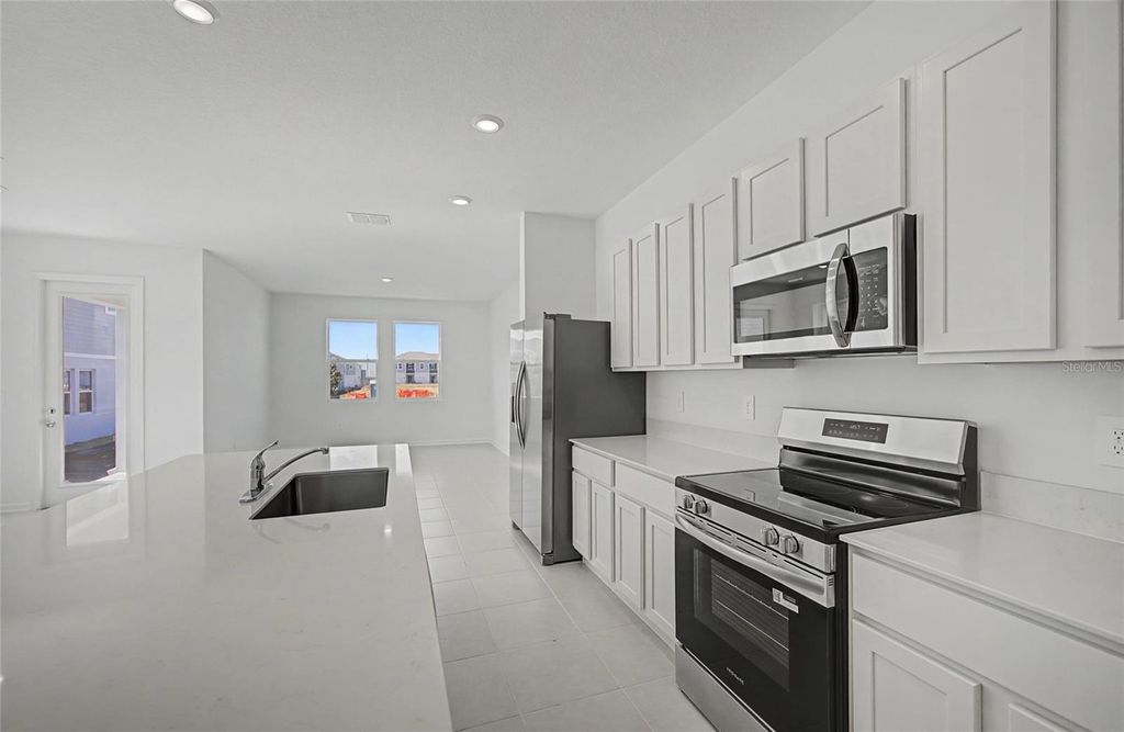 Photo of 2685 Bevel Lane, Davenport, FL 33837 (MLS # O6377185)