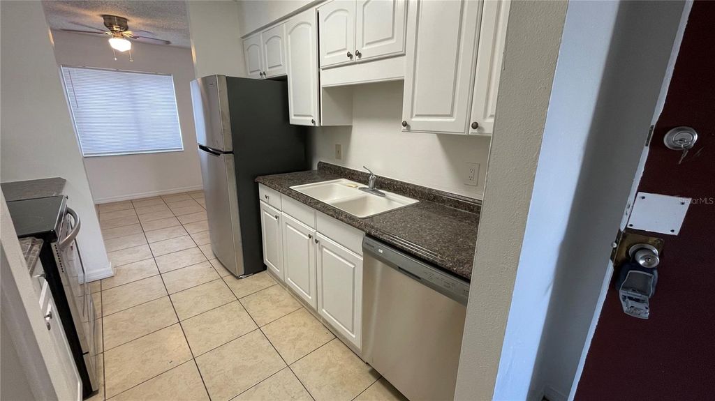 Photo of 7502 Needle Leaf Place #66, Tampa, FL 33617 (MLS # O6368935)