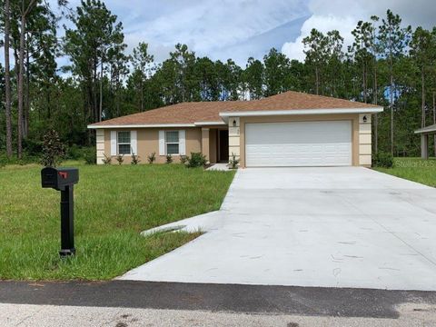 Photo of 36 Renshaw Drive, Palm Coast, FL 32164 (MLS # FC314131)