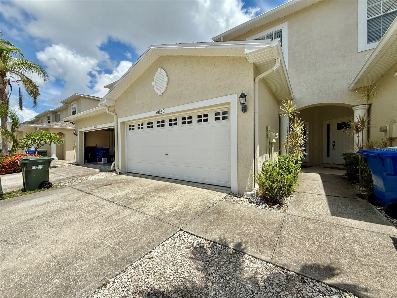 Welcome to your new home! This beautifully maintained 3/BDR, 2.5/BTH townhome offers comfort, space, and convenience in one of the most sought-after locations—just south of East Bay off Belcher Road, tucked away on a quiet cul-de-sac. Step inside to a generous foyer with a convenient powder room, leading into a bright and open living and dining area with soaring ceilings and access to your own private, fenced courtyard and covered patio—perfect for outdoor relaxation or entertaining. The spacious kitchen is a chef's dream, featuring white cabinetry, matching appliances, a large island with breakfast bar, two pantries, and a full inside laundry room with washer and dryer included. Downstairs boasts new vinyl plank flooring. Upstairs, a versatile landing area offers a great spot for a cozy home office. The oversized primary suite is a true retreat, complete with a walk-in closet, space for a sitting area, and a luxurious en suite bath with dual sinks, soaking tub, and walk-in shower. Two additional nicely sized bedrooms share a full hallway bath. Located nearby are bars and restaurants such as Jimmy's Crow's Nest, Shephard's Tiki, Coco's Crush, Shipwreck. Apply today before this gem is gone!
