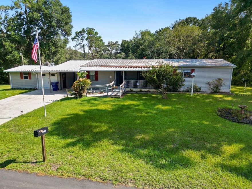 The asking price is below appraised value! Take a look at this very well-maintained home in Floral City… 1988 DWMH… 1474 sqft… .49 acre. Inside you will find: Split floor plan, 3 bedroom, 2 bath, Living room/dining room combo, Wood burning fireplace, Laundry room off from the kitchen, Kitchen with eating area. Outside you will find: Screened front porch, Metal reroof 2012, Screened inground pool, Enclosed back porch, Carport, Garage, City water hookup is coming soon