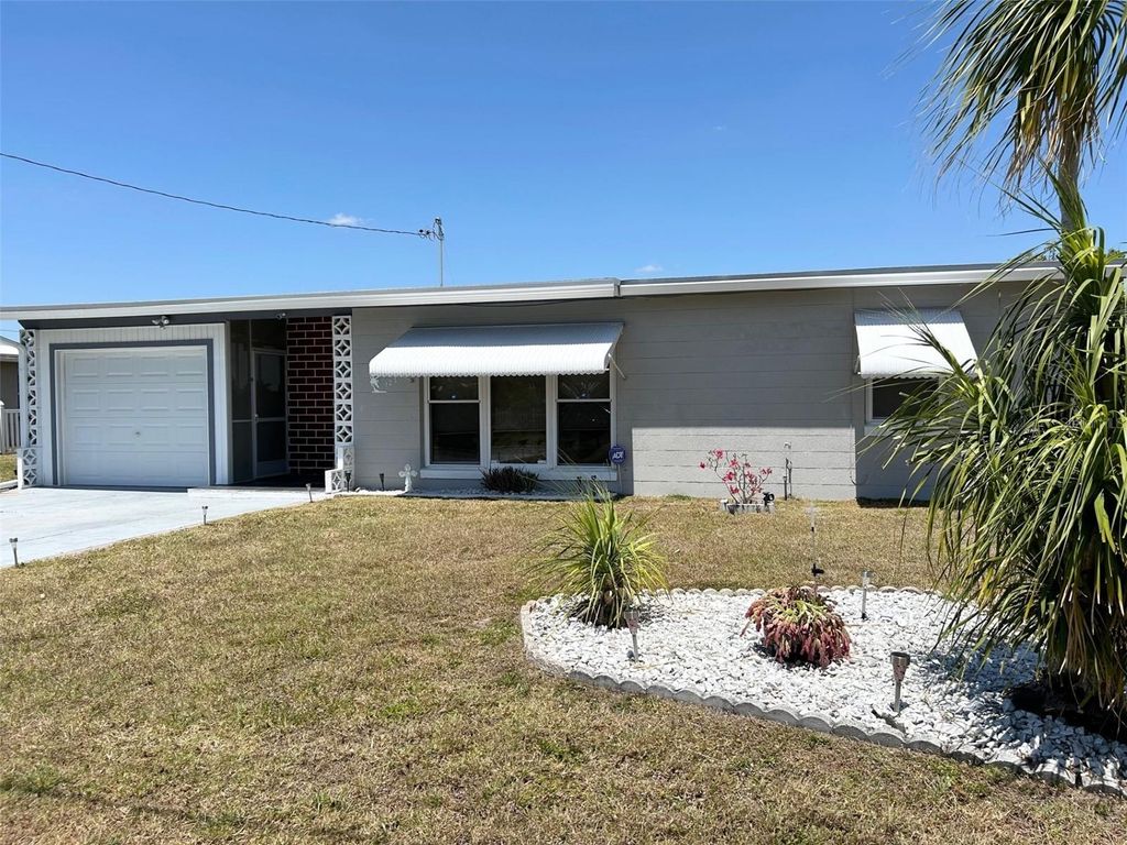 Photo of 123 Poinsettia Circle NE, Port Charlotte, FL 33952 (MLS # C7525256)