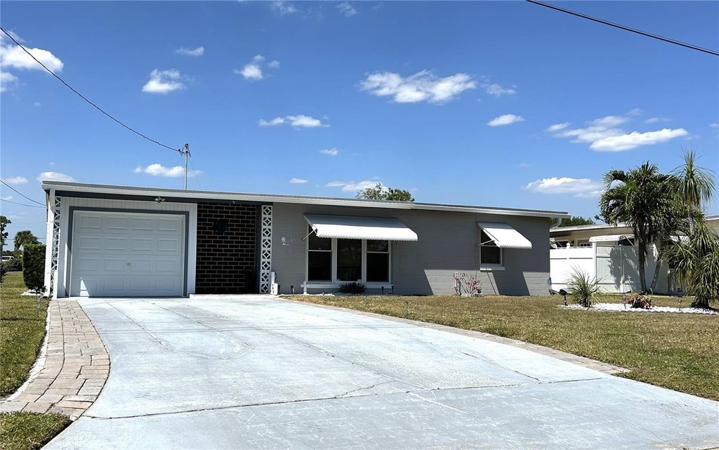 Photo of 123 Poinsettia Circle NE, Port Charlotte, FL 33952 (MLS # C7525256)