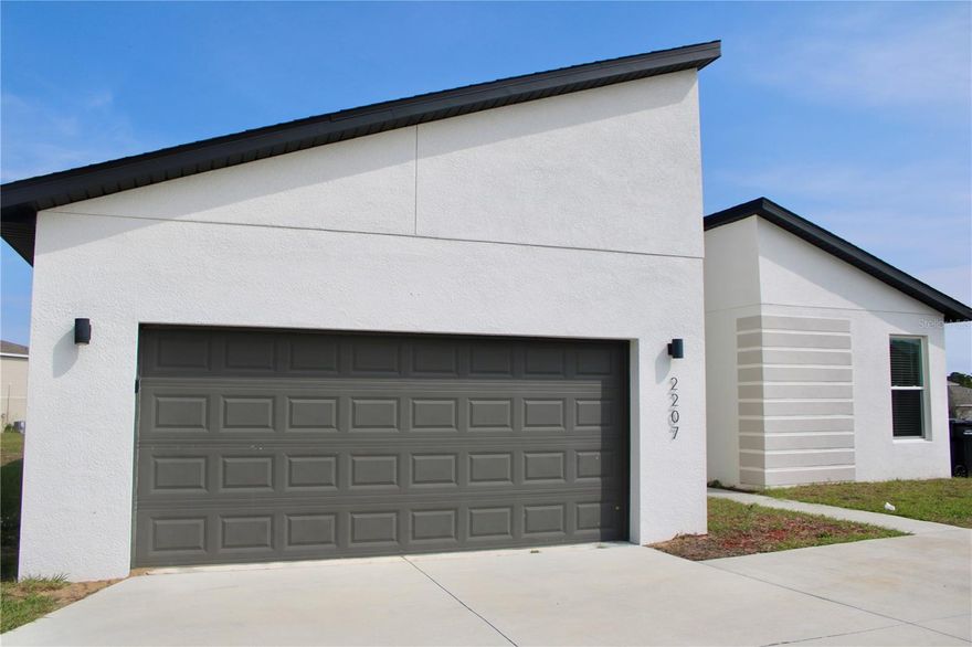 One or more photo(s) has been virtually staged. Beautiful 2022 built home in Poinciana featuring 4 bedrooms and 2 bathrooms with a bright, open-concept layout. Enjoy tile flooring in main areas, neutral finishes, and a spacious living area perfect for entertaining. The primary suite offers a comfortable retreat on one side, while additional bedrooms provide flexibility for family or a home office. Conveniently located near shopping, dining, and major roadways. Great opportunity for growth. Move-in ready schedule your showing today!