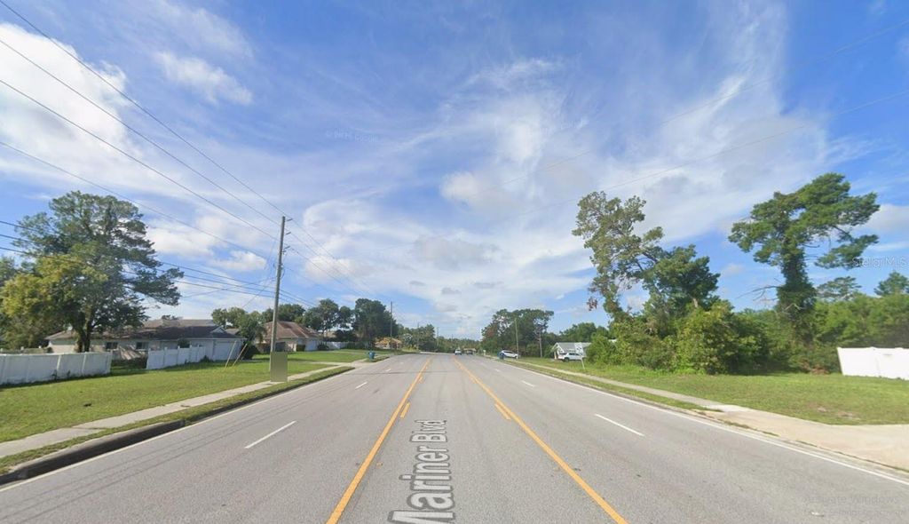 Photo of 6241 Mariner Boulevard, Spring Hill, FL 34609 (MLS # O6397404)