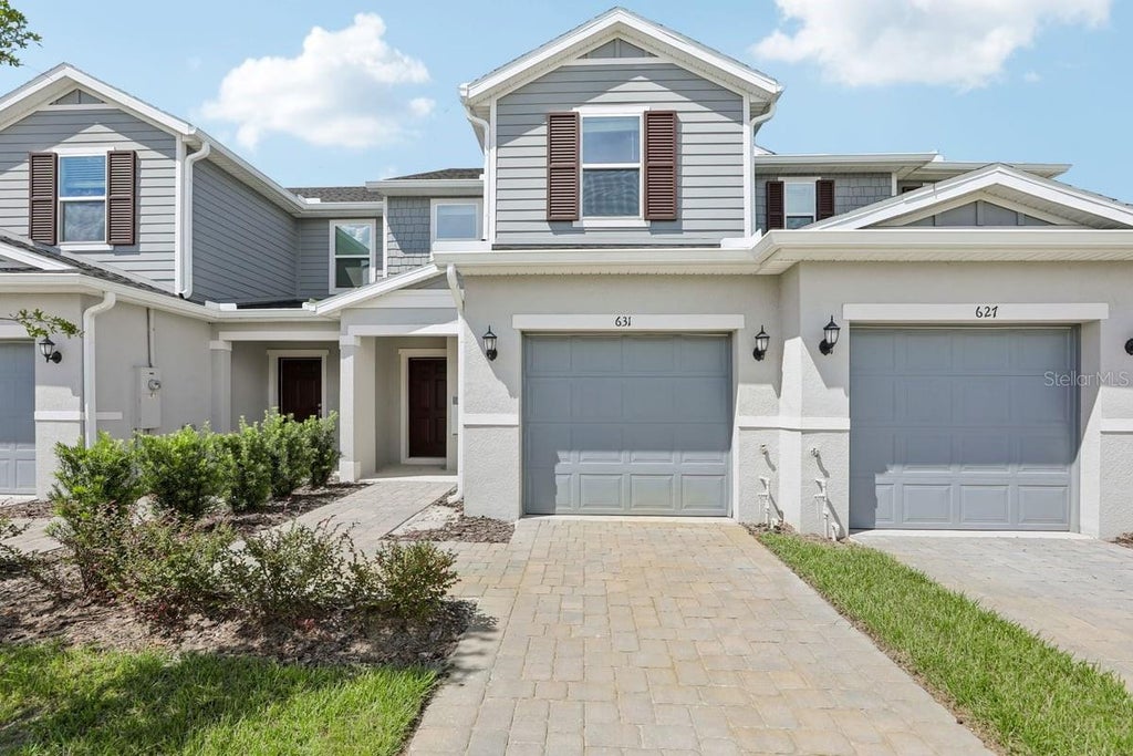Photo of 631 Meadows Edge Place, Lake Wales, FL 33859 (MLS # O6443300)