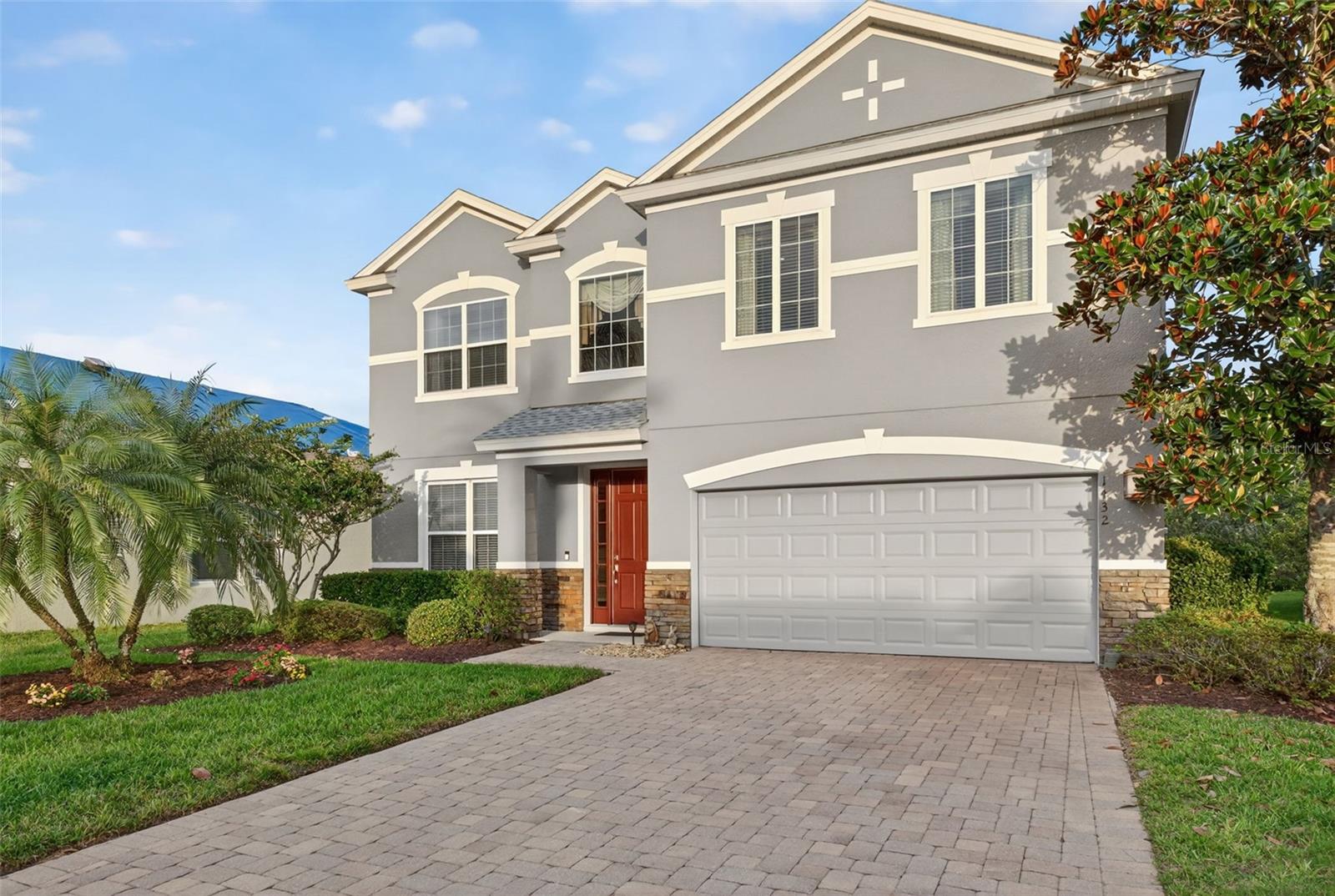Welcome to 1432 Brookhaven Court, where elegance, comfort, and resort-style living meet.
Located on a quiet cul-de-sac in the beautiful Providence Golf Community, this spacious 5-bedroom, 4-bath, 2 Car Garage pool home features a unique and functional floor plan filled with upgrades and charm.
The exterior boasts a sealed paver driveway, stone-accented front elevation, and a welcoming entry that leads into a grand formal living and dining area, perfect for entertaining.
The gourmet kitchen includes a wall oven and microwave, stove top, tall upgraded wood cabinets, and a filtration system under the sink. The open layout flows seamlessly into a comfortable family room filled with natural light.
A beautiful wood rail grand staircase leads to the second floor, where you’ll find the Jack and Jill bedrooms along with the additional bedrooms and a fully furnished theater room with a pool table, ideal for movie nights or gatherings.
The home showcases travertine floors and 2024 Luxury Vinyl Plank flooring on the first floor for a modern and durable touch. Major updates include a new roof in 2024, a new air conditioner in 2025, and a new pool pump and control panel.
Step outside to your private screened-in pool area overlooking peaceful lake views, surrounded by lush landscaping and fruit trees in the backyard — the perfect retreat for relaxation and entertaining.
Enjoy the tranquility of cul-de-sac privacy along with all the resort-style amenities Providence has, including a championship golf course, clubhouse, fitness center, tennis courts, and more.
This home blends comfort, style, and convenience in one of Central Florida’s most desirable communities. Schedule your private showing today and experience luxury living in Providence.