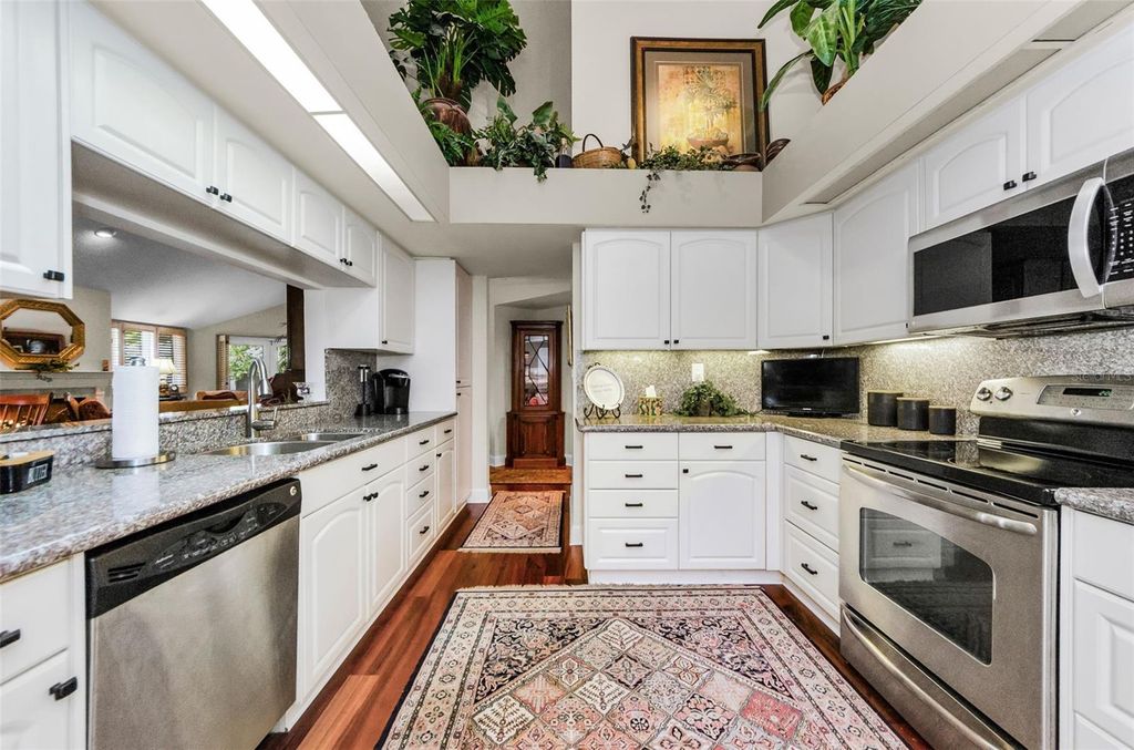 Photo of 10425 Longwood Drive, Seminole, FL 33777 (MLS # TB8435584)