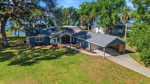 Photo of 7250 Treasure Island Road, Leesburg, FL 34788 (MLS # O6391208)
