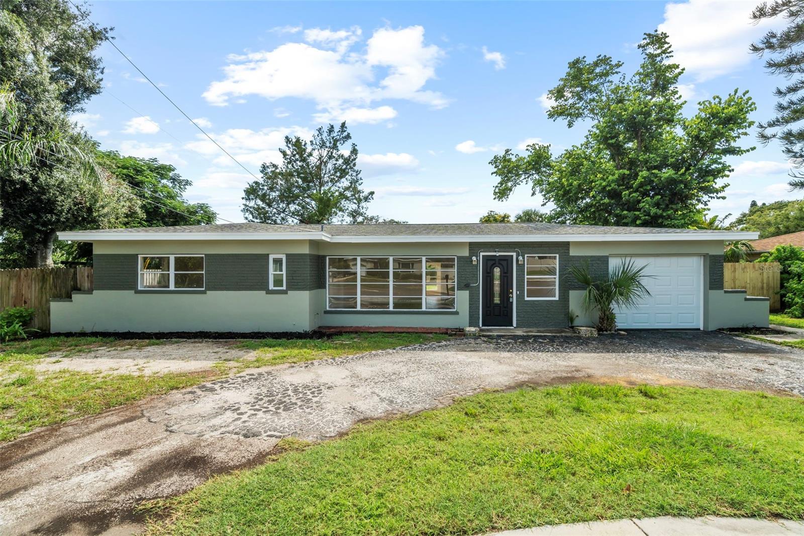 Offered for sale is this incredible, renovated, 2-bedroom, 2-bathroom, 1 car garage block home in the heart of Gulfport, FL. Located in the highly sought after neighborhood of Pasadena Golf Club Estates, this Gulfport home is only minutes from local beaches, shopping, and fantastic waterfront dining. The home has gone through a full cosmetic rehab including new luxury vinyl floors, new paint throughout both the exterior and interior of the home, a fully renovated kitchen, fully renovated bathrooms, and much more ! A brand new HVAC, Garage Door, and multiple new windows were just installed in July of 2025 offering peace of mind for its next owners. An additional highlight of this property is the massive fully fenced backyard, perfect spot for entertaining, gardening, or for all of your furry friends. The one car garage provides ample space for your toys while an enclosed utility room is perfect as an additional workshop space. The large living room on the rear of the home can easily be used as a 3rd bedroom for those needing some extra sleeping space. X500 flood zone means that no flood insurance is required, potentially saving thousands per year on insurance. Schedule your private showing today !