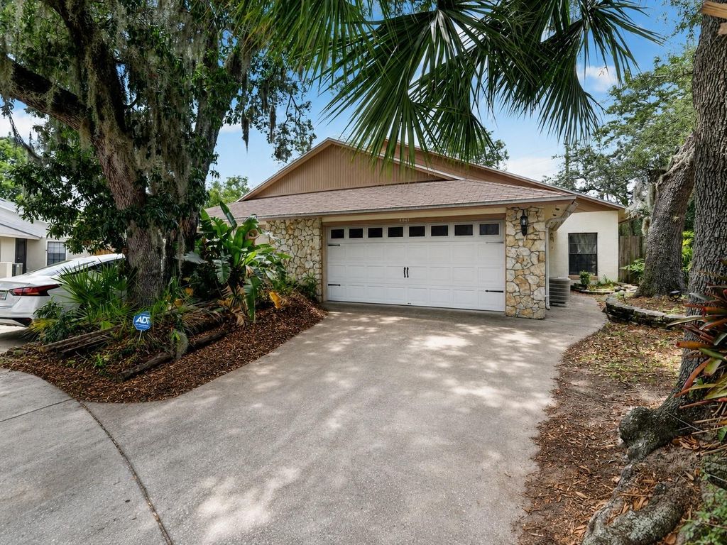 Photo of 5290 Indian Laurel Court, Orlando, FL 32808 (MLS # TB8514481)