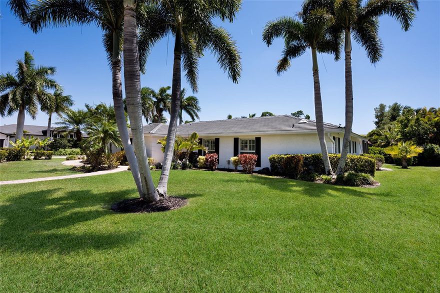 This tastefully updated and remodeled single story home is ideally located within the sought after Bird Key neighborhood. Set on a large corner lot, it features a clean, contemporary style that feels both current and easy to live in. The home offers three bedrooms, two and a half bathrooms, and a two car garage, creating a comfortable and well balanced living environment. Inside, the open concept split floor plan provides both flow and definition, with separate living and family rooms suited to modern living. The remodeled kitchen features quartz countertops and sleek contemporary cabinetry and is centrally positioned to connect the main living, dining, and family spaces.
Both living areas open through impact sliding glass doors to the lanai and pool, creating an easy transition between indoor and outdoor living. Fully opening sliders from the living and family rooms extend the space onto the pool deck, making the home particularly well suited for entertaining. The primary suite includes a spacious bedroom, walk in closet, and an updated en suite bathroom. Two additional guest bedrooms and a bathroom are located on the opposite side of the home, offering privacy for family and guests. The generously sized family room easily incorporates a small home office area. Recent improvements include a new tile roof in 2025, whole house propane generator 2025, a newer air conditioning system in 2023, and impact windows for added security and peace of mind. Bird Key offers one of Sarasota’s most desirable locations, just minutes from downtown Sarasota, St. Armands Circle, and Lido Beach. Residents also benefit from the nearby Bird Key Yacht Club, currently undergoing a full redevelopment and expected to reopen early in 2027 as a premier destination for boating, tennis, and social activities. PLEASE NOTE FRONT DOOR ENTRY IS LOCATED ON BOBWHITE WAY.