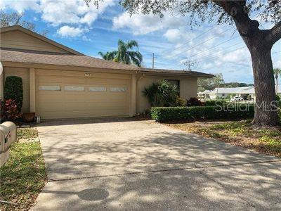 This charming condo located at 4418 Rum Cay Cir in Sarasota, FL offers a peaceful retreat in a convenient location. This is a 55+ community. Built in 1983, this home offers a timeless design and a welcoming atmosphere. Boasting a living room, family room, screen lanai, florida room, and an area of 1,893 sq.ft., there is plenty of space to relax and entertain. The property sits on a beautiful lot overlooking a water feature and providing ample room to enjoy the outdoors.The exterior of the condo features a classic stucco finish and a well-maintained landscape, creating a beautiful curb appeal. The interior of the home is warm and inviting, with an open floor plan and vaulted ceilings that flows seamlessly from room to room. The living room is large and bright, with many windows that let in plenty of natural light. The kitchen is equipped with modern appliances, quartz countertops, modern cabinets, and a breakfast bar for casual dining.The master bedroom is a tranquil retreat, complete with a private recently remodeled en-suite bathroom and a spacious closet. The second bedroom is perfect for guests with its nearby bath. The third bedroom includes a murphy bed so to optimize the space.Outside, the condo offers a private patio where you can enjoy your morning coffee or dine al fresco. Residents of this community also have access to shared amenities such as a swimming pool and adjoining clubhouse.Located in Sarasota, FL, this condo is conveniently situated near shopping, dining, entertainment, and Siesta Key beach. Besides the beach there is a vibrant arts scene, and family-friendly attractions. Whether you're looking for a permanent residence, a vacation home, or an investment property, 4418 Rum Cay Cir offers a comfortable and convenient lifestyle. Don't miss your chance to make this lovely condo your own.