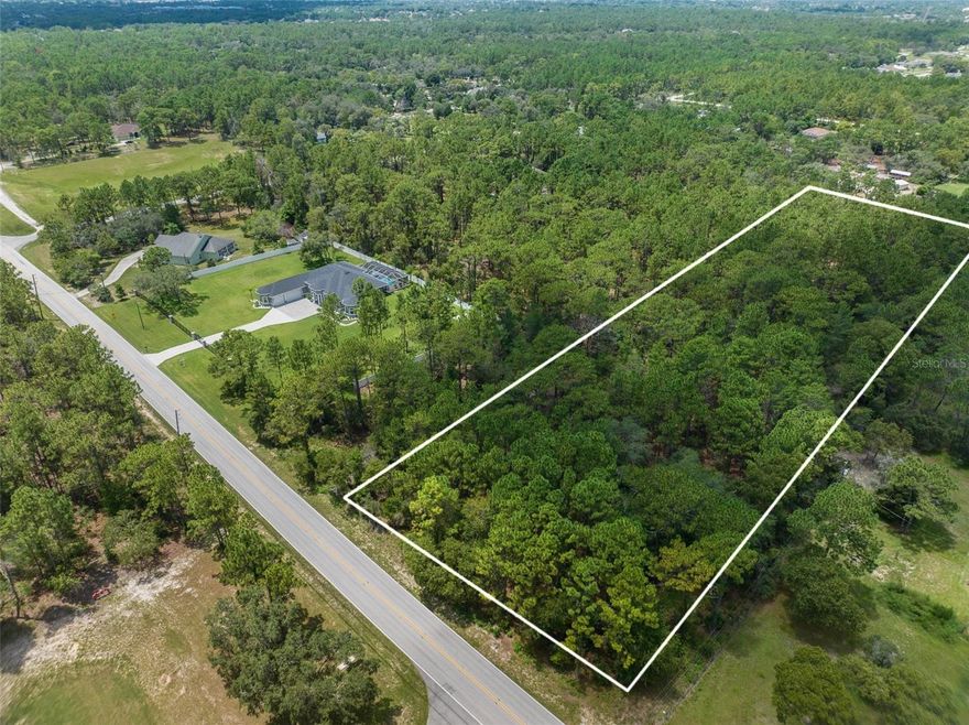 GORGEOUS 4.8 ACRES! Build your dream home on this beautiful wooded property! Clear out just enough for your home and yard...or clear it all into pastures and bring the horses! The house to the left of the property just sold for $1.18M. There are several large homes on the Barclay in a row near this property! It is also located in the center of Hernando County only minutes to EVERYTHING...minutes to Cortez/Hwy 50, minutes to Spring Hill Drive, minutes to the Suncoast Parkway for easy and quick access to Tampa for work and play! Minutes to multiple hospitals, grocery shopping, cafés, restaurants, movies, shopping, and more! 10 minutes to the Weeki Wachee State Park...home of the Mermaids and Buccaneer Bay Water Park, sunsets at Pine Island Beach, fishing and boating in Hernando Beach! 1 hour to TOP US Beaches! Come see this beautiful property on Barclay Avenue in the heart of Hernando County in the Brooksville/Spring Hill area! Great location! ZONED AR2 so bring the horses, pets, RVs, boats, ATVs, toys...bring it all!  NO FLOOD! Just a BEAUTIFUL area!