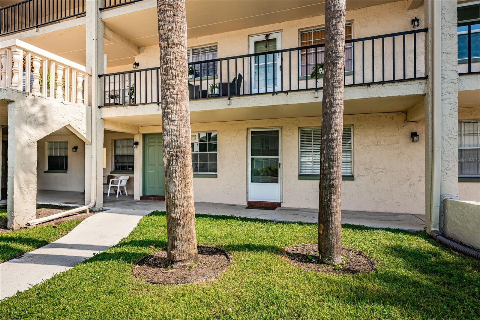 Carefree Coastal Living in a Prime 55+ Community! Welcome to Seminole Square Apartments—where comfort, convenience, and location come together! This spacious 1-bedroom, 1-bathroom first-floor unit offers 935 sq ft of well-designed living space in a NON-FLOOD ZONE, just minutes from the beach and centrally located near shopping, dining, and entertainment. Step inside to discover a bright and freshly painted open floorplan, upgraded luxury vinyl plank flooring, and a versatile Florida Room that adds even more livable space. The generously sized bedroom features a walk-in closet, while the covered parking spot is located directly in front of the unit for unbeatable convenience. Bonus—you're also next door to the laundry room! Enjoy a vibrant, active lifestyle with access to a clubhouse, community pool, and shuffleboard courts—perfect for socializing or relaxing. Whether you're looking for a seasonal getaway or full-time Florida living, this move-in ready gem checks all the boxes!