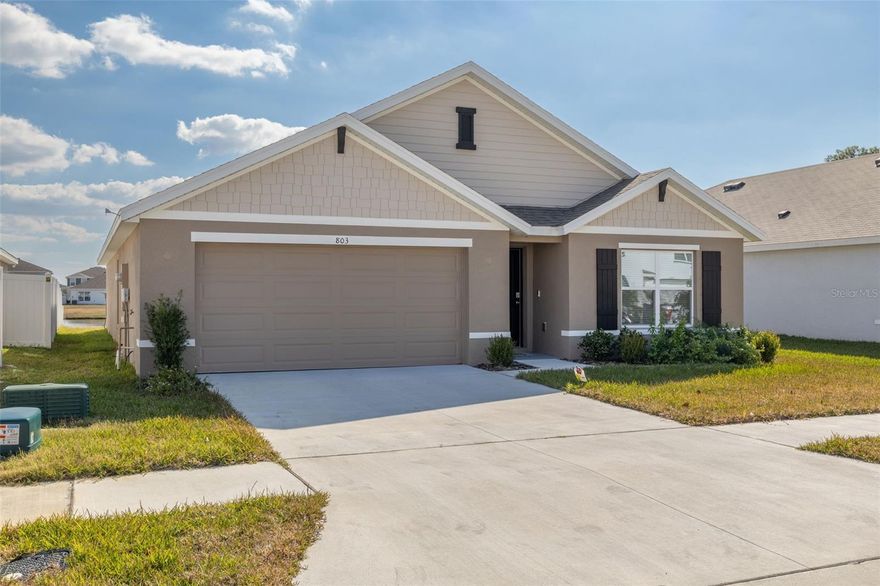 Built in 2025, this beautifully maintained newer home at 803 Ace Outlaw Ave in Ruskin, Florida offers a modern open-concept layout with quality finishes and scenic pond views. The spacious living and dining areas connect to a contemporary kitchen featuring shaker-style cabinetry, solid-surface countertops, stainless steel appliances, recessed lighting, and a large center island with seating and additional workspace. Durable luxury vinyl plank flooring runs throughout the main living areas, creating a clean and modern feel while large windows and sliding glass doors provide abundant natural light and views of the backyard and water. The covered patio overlooks the backyard and pond, providing an inviting outdoor area to enjoy the surrounding setting. The thoughtfully designed floor plan provides generous living space, comfortable bedrooms, and modern construction features throughout. Tenant is responsible for water, electric, and lawn maintenance; lawn care service can be added for a separate monthly fee. Owner pays for trash service and HOA fees. Convenient access to shopping, dining, and major commuter routes including Interstate 75 makes this property a great option for those seeking a newer home with contemporary finishes and peaceful water views.