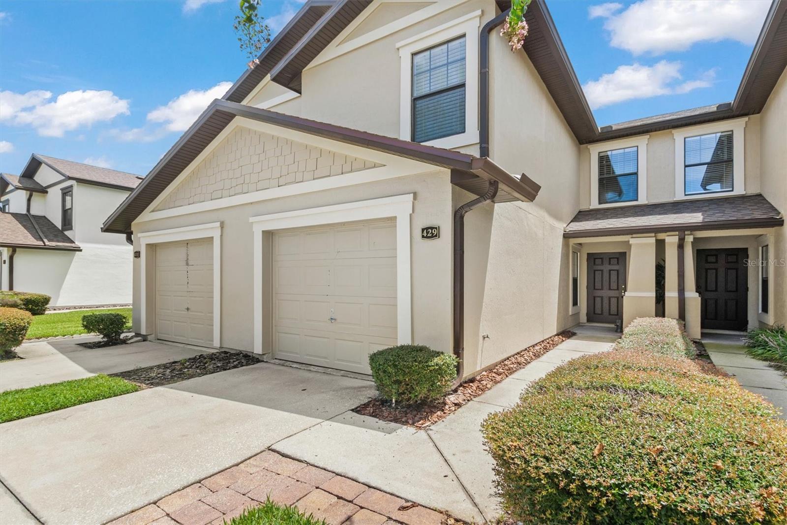 Discover the perfect mix of style, comfort, and convenience in this beautifully updated 3-bedroom, 2.5-bath townhome in the Paloma community. With 1,548 square feet of living space, this home features an open-concept main floor where natural light fills the area. The kitchen, fully renovated in 2024 with brand-new stainless steel appliances, serves as the heart of the home—ideal for cooking and entertaining. Step through sliding glass doors to your back yard and take in serene lake views. Upstairs, the primary suite offers peaceful lake views and a private bath, while two guest bedrooms share a convenient Jack-and-Jill layout. Recent upgrades include a new roof (2024), water heater (2023), and HVAC (2021), giving you peace of mind for years to come. Enjoy community amenities like a pool and playground, plus easy access to dining, shopping, and coffee spots nearby.