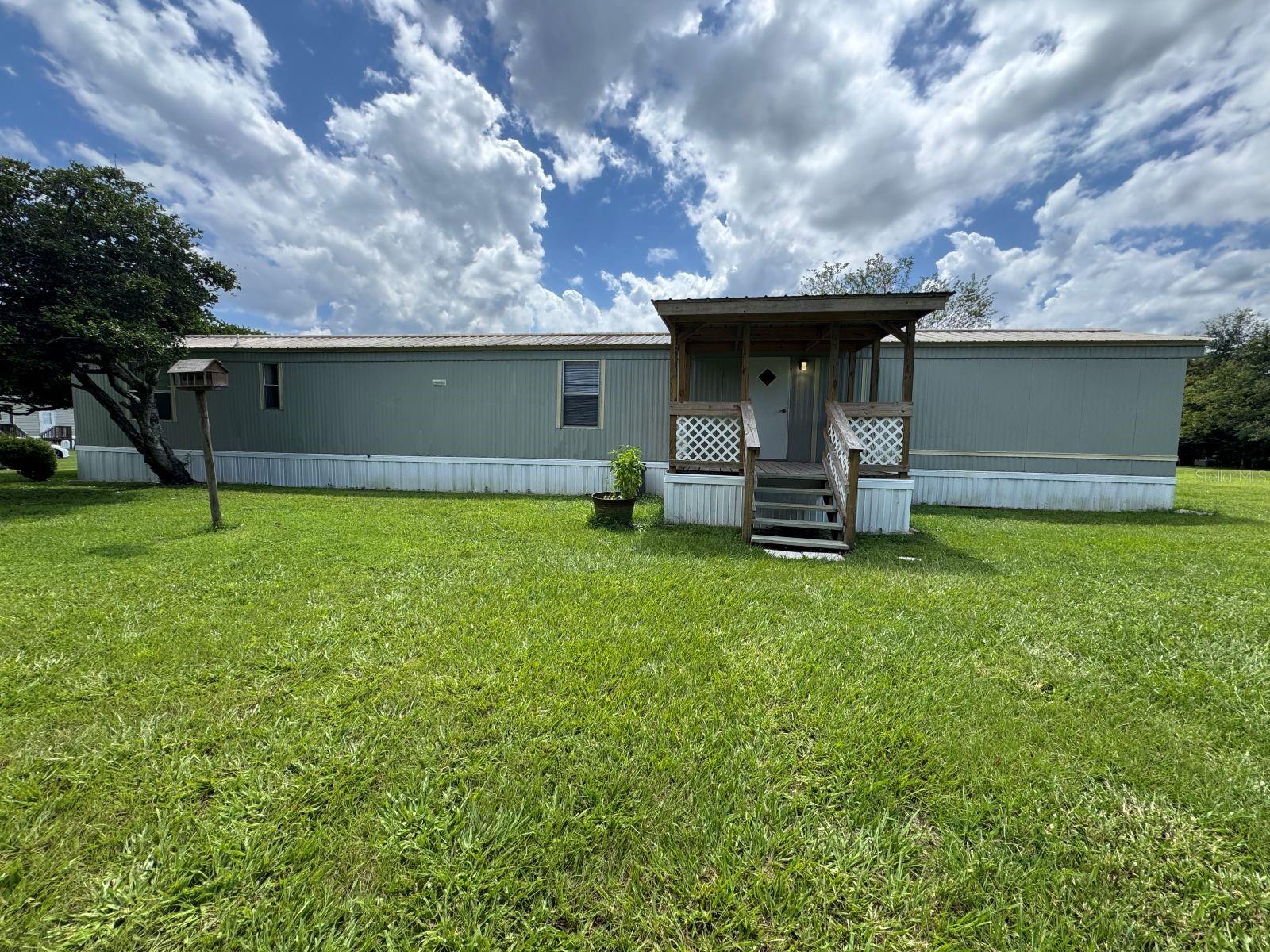 Affordable country living at its best! This newly remodeled 2 bedroom, 2 bath home features a spacious living room, a cute and functional kitchen, and a versatile flex room/office. The large master suite with private bath gives you plenty of room to relax.
Enjoy the outdoors with both a front and rear covered porch, perfect for morning coffee or evening sunsets.
If you?ve been looking for peace and quiet in the country without sacrificing convenience, this one is for you!