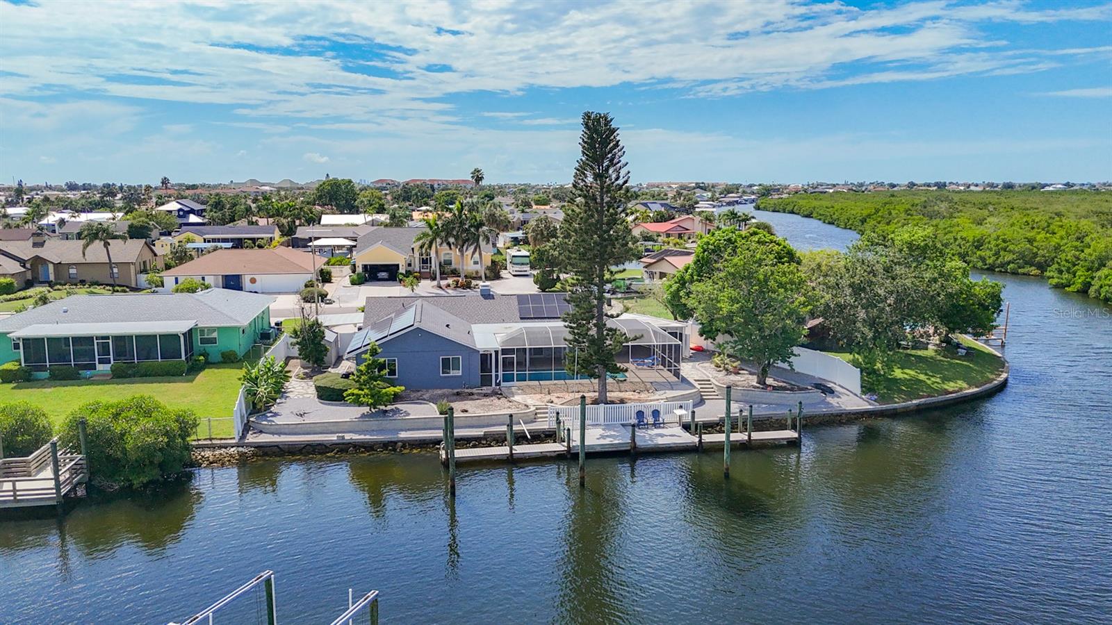 Discover the ultimate waterfront lifestyle in this stunningly renovated home, perfectly situated at the end of a quiet cul-de-sac with direct sailboat access to Tampa Bay. Designed with elegance and comfort in mind, this property blends modern luxury with everyday convenience. Step inside to find gleaming marble floors, an open-concept layout, and a chef’s dream kitchen featuring smart appliances, a porcelain cooktop, quartz countertops, and a smart sink and refrigerator. The bathrooms are a true retreat, with spa-like showers and smart mirrors equipped with LED lighting and anti-fog technology. The spacious master suite offers a private escape, while two bedrooms and three sliding doors open to breathtaking canal views.Outdoors, this home is built for both relaxation and entertaining. Enjoy the sparkling saltwater pool with heater and lights, an a full outdoor kitchen perfect for summer gatherings, and a beautifully landscaped yard overlooking the water. Boating enthusiasts will appreciate the private boat ramp, RV/boat parking, and impact-resistant windows and doors with a transferable warranty for peace of mind. Solar panels keep energy bills low, and the attached two-car garage and carport provide plenty of space.
This home has been completely renovated and includes a brand-new roof, new A/C system, and new water heater, offering buyers true move-in-ready peace of mind. It can also be sold fully furnished with high-quality designer furniture.
Ideal as a primary residence, vacation retreat, or investment property, this is more than just a house it’s a lifestyle. Don’t miss your chance to own this waterfront dream home! Call me for a private tour.