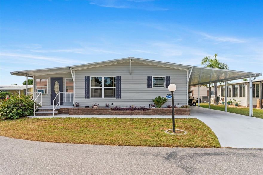 Welcome to Lazy River Village! One of the premiere (if not THE best) 55+ waterfront manufactured park in all of Sarasota and Charlotte counties! The BEST amenities, clubs, and selection of activities you will find in any co-op park in all of Sarasota county and even Charlotte County. Lazy River is located on the banks of the beautiful Myakka River. This 2 bed 2 bath home is ready to move right in and immediately begin living the Florida lifestyle. All of the furnishings convey with the exception of two lamps and some pottery. Golf cart conveys. Easy-to-care-for laminate flooring adds warmth and charm to the home.

 This home is the perfect seasonal place to enjoy Florida's coveted gorgeous winters and a perfect year-round home for those who love all 4 seasons of Florida. If you enjoy an abundance of activities, you will have plenty to choose from in Lazy River Village: Pickleball, tennis, bike clubs, card clubs, and pontoon boating. They even have a professional woodworking shop. A low monthly fee of $276 includes all the amenities. There are other amenities for an extra fee, such as a marina slip if your home is not located on the water. 

One of the things that makes Lazy River Village so great is its proximity to...well...everything! Be prepared to enjoy Florida's wildlife at its finest, both inside the Lazy River Village complex and at abundant state parks and nature preserves. Shopping and dining surround you in all directions. The spring training homes of both the Atlanta Braves & the Tampa Bay Rays are just a minutes away. The world-renowned Gulf of Mexico beaches are all within 30 minutes or less! 1) Englewood beach, 2) Casperson Beach (GREAT for shelling), 3) Venice Beach (shark tooth capital of the world), 4) Brohard Paw Park, 5) Nokomis beach (you've GOT to experience the weekly drum circles), 6) the island gem of southwest Florida: Boca Grande... And finally: 7) Siesta Key in Sarasota has been ranked multiple times as the number one beach in the nation and is a mere 35 minutes away. Lazy River Village offers a lifestyle that every retiree dreams of. You have the quaint downtowns of Venice and Punta Gorda--both cities are often ranked as Top 10 destinations in the country for retirement. Another local favorite, Englewood, is a cozy, fun beach town on the Gulf of Mexico. 

The residents of Lazy River Village agree: Lazy River is a community that offers it all. Don't miss your chance to see this home!