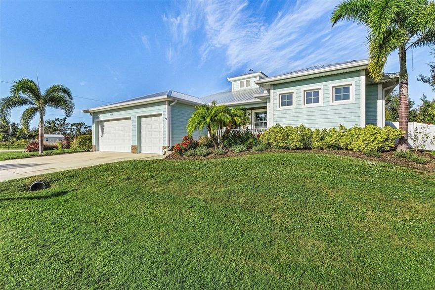 This beautiful Key West style home, built in 2018, offers a spacious and luxurious living space. With three bedrooms, two bathrooms, and a three-car garage, it provides ample room for comfortable living. 

One of the highlights of this home is the heated saltwater pool, which includes an automatic pool vacuum for easy maintenance. The pool area is perfect for relaxation and enjoyment. 

The home features a huge open floor plan, creating a seamless flow between rooms and a sense of spaciousness. The metal roof adds durability and a touch of style, while the huge front porch provides a welcoming entryway. 

For added convenience and protection, the home is equipped with electric roll-down hurricane shutters in the front and back. Additionally, all windows and sliders are hurricane impact, ensuring safety during storms. 

Inside, plantation wood shutters provide privacy and add a touch of elegance to the windows. Roll-down electric shades in the bedrooms and family room allow for easy control of light and privacy. 

Outdoor enthusiasts will appreciate the outdoor kitchen, complete with a grill, fridge, and sink. The no-see-em screen enclosure keeps bugs at bay, while the built-in outdoor ceiling fans with Bluetooth speakers create a pleasant atmosphere for gatherings and relaxation. 

The kitchen is equipped with a reverse osmosis water treatment system, ensuring clean and purified water. The soft-close cabinets and drawers with pullouts add both style and functionality. 

The fully vinyl-fenced backyard offers privacy and security, while the absence of an HOA and flood concerns provide freedom and peace of mind. 

All doors in the home are tall and massive, adding a touch of grandeur. 

The primary suite features a dual walk-in shower, his and her sinks on opposite sides, and his and her walk-in closets, providing ample storage space. The guest bathroom includes a deep garden tub with jets, perfect for relaxation. 

LVT flooring in a light gray tone flows throughout the home, creating a modern and stylish look. The kitchen includes an eating space, and a huge walk-in pantry offers plenty of storage. 

The inside laundry room includes a folding area and sink, making laundry tasks convenient and organized. The home is move-in ready, allowing for a seamless transition. 

Situated on a corner lot with vacant lots behind and to the left, this home offers privacy and tranquility. Additionally, a generator conveys with the property, providing peace of mind during power outages. 

With its Key West style charm, modern amenities, and convenient location, this home is an exceptional find.