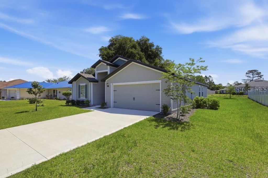 Photo of 48 Prattwood Lane, Palm Coast, FL 32164 (MLS # FC317901)