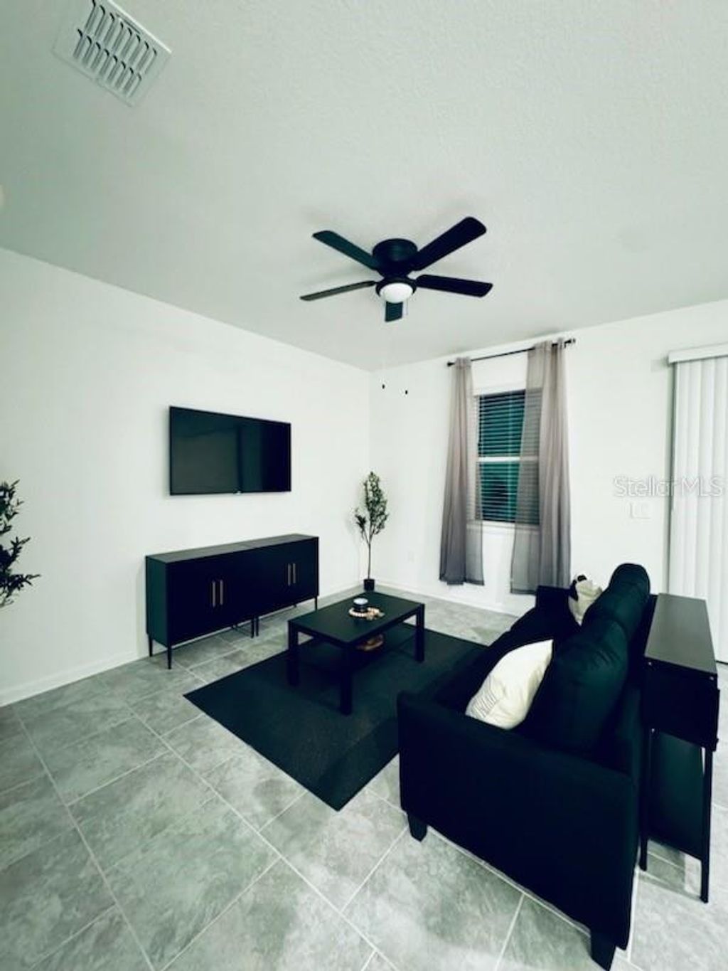 Photo of 3185 Laurent Loop, Davenport, FL 33837 (MLS # S5136676)