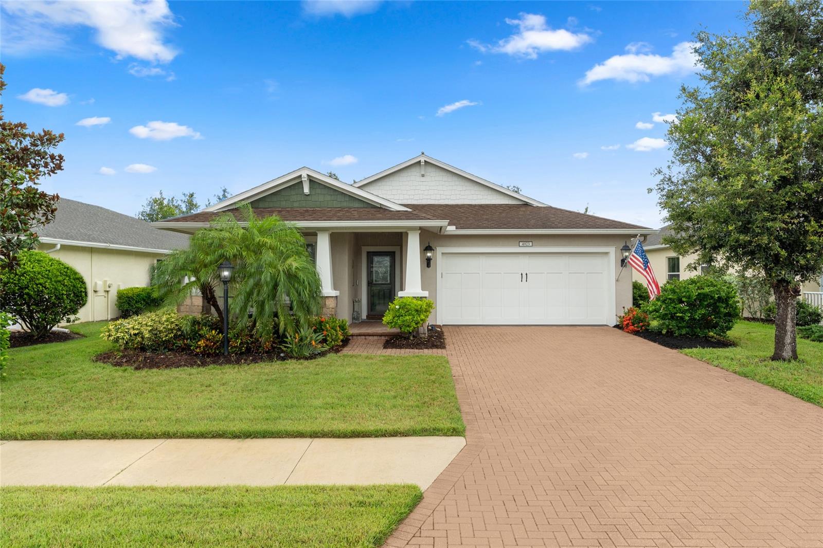 Discover this exceptional custom built home, perfectly positioned on a tranquil pond in the heart of the gated Central Park community in Lakewood Ranch. Thoughtfully designed and meticulously maintained, this three bedroom, two bath pool home that blends timeless style, smart functionality, and curated upgrades that set it apart from the ordinary. From the elegant tray ceilings and solid wood cabinetry to granite and quartzite countertops, Bosch appliances, and custom door finishes with satin nickel levers, every detail has been carefully considered. Smart home enhancements include LED lighting, Lutron lighting controls in the kitchen and living room and a lawn irrigation system designed for comfort, efficiency and ease. Additional highlights include built-in speakers, architectural accents, and a spacious primary suite with dual sinks and a newly updated walk-in shower (2024). The garage is enhanced with an insulated door and Mitsubishi mini-split AC (2024), while recent upgrades include new bedroom lighting (2025), LED recessed lighting in the kitchen, living room, and den (2021), and interior painting (2024/25). The kitchen is a showpiece, featuring a pearl shell backsplash, extended and reconfigured cabinetry, and a quartzite island crafted from natural Brazilian stone (2022). The exterior, painted in 2023 with Sherwin Williams Rain Refresh self-cleaning paint, is complemented by professionally designed landscaping and side gutters (2021) for lasting curb appeal. Step outside to your private backyard oasis: a screen-enclosed, custom 14’x27’ heated saltwater pool with sun shelf, pebble tec finish, fountains, mosaic art, and LED lighting. Expansive decking with slip-resistant pavers creates the perfect space for entertaining, while tranquil pond views provide a serene backdrop. The lanai is also primed with a gas line-ready for your future outdoor kitchen. Central Park is more than a neighborhood, it’s a lifestyle. Residents enjoy two dog parks, a splash pad, playground, sports fields, pickle-ball and tennis courts, a concession stand, picnic pavilion, and year-round community events, all within a secure, welcoming gated setting. Located in an A+ school district and just minutes from award-winning beaches, golf courses, UTC shopping, downtown Sarasota, historic Old Main Street Bradenton, and major airports, this home truly offers luxury, convenience, and community all in one. Come and see this amazing home today and make it yours tomorrow!
