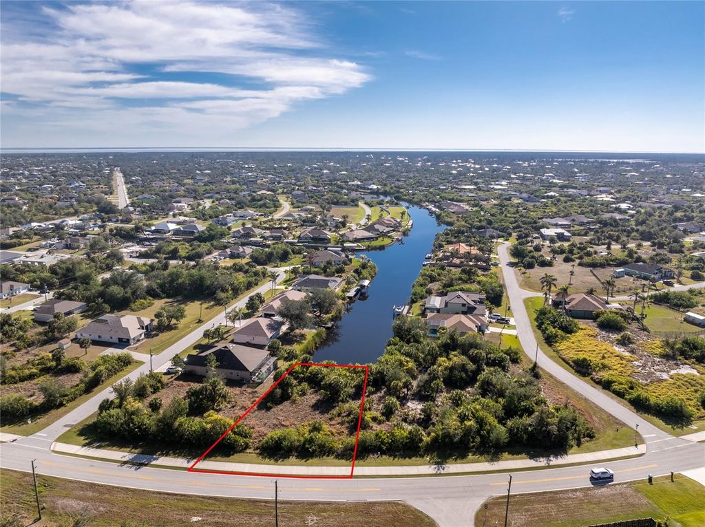 Photo of 9872 Calumet Boulevard, Port Charlotte, FL 33981 (MLS # D6139553)