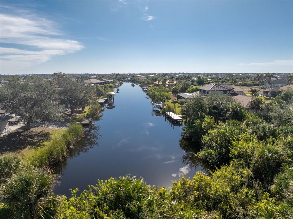 Photo of 9872 Calumet Boulevard, Port Charlotte, FL 33981 (MLS # D6139553)