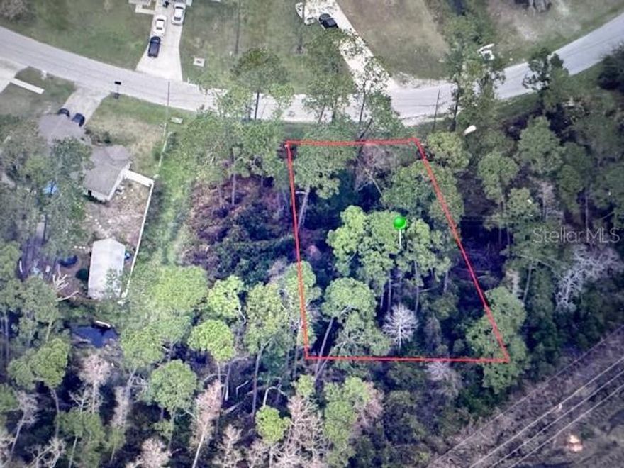 Lot in Desirable Deltona, FL!   This is your opportunity to secure a lot in the fast-growing community of Deltona. The environmental study is complete, mitigation is done and the seller has all the necessary documentation in hand, including house plans and surveys. Whether you choose to build with the current plans or design your own dream home, you’ll benefit from over a year of groundwork already completed, saving you valuable time and effort. All the heavy lifting has been done, making this a seamless path toward starting construction.  Surrounded by homes and nestled in a thriving area poised for continued growth, this lot offers the perfect canvas to create your custom residence in a welcoming neighborhood with convenient access to local amenities, schools, parks, and more.  Call me today for all the details and to take the next step toward making this dream a reality.
