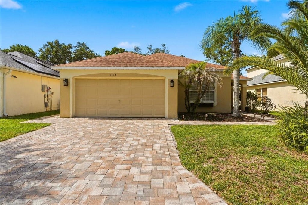 Photo of 1412 Park Place, Haines City, FL 33844 (MLS # P4939064)