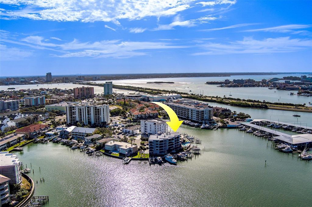 Photo of 205 Dolphin Point #1, Clearwater Beach, FL 33767 (MLS # TB8458747)