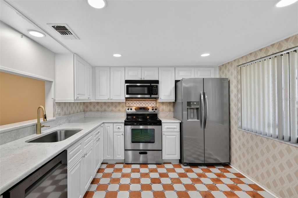 Photo of 2555 Royal Pines Circle #15A, Clearwater, FL 33763 (MLS # TB8419423)