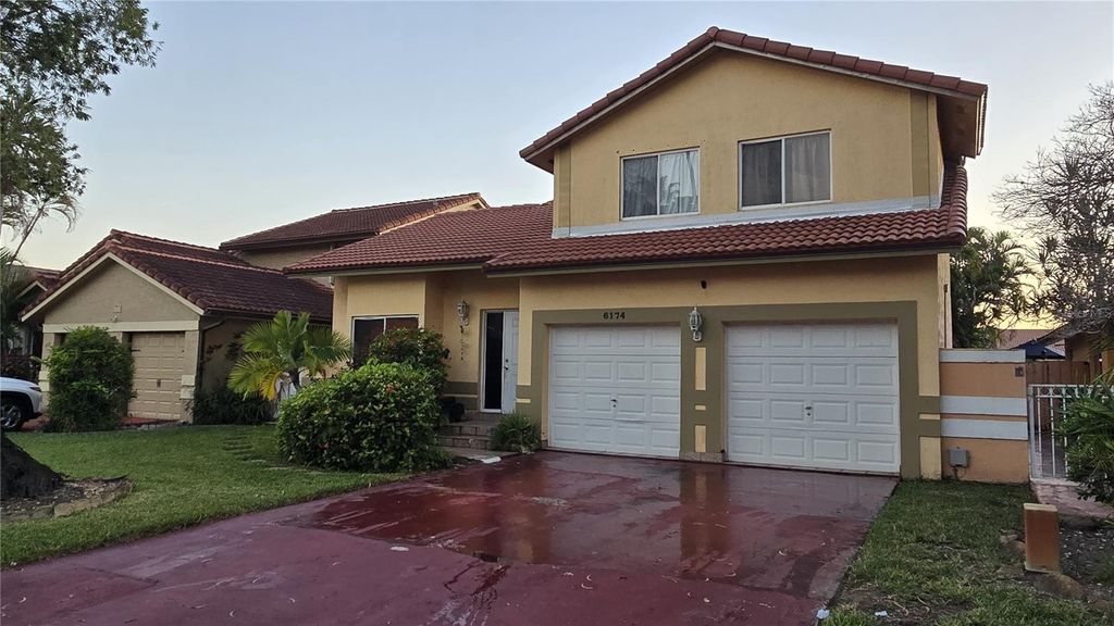Photo of 6174 NW 183rd Lane, Hialeah, FL 33015 (MLS # O6364037)
