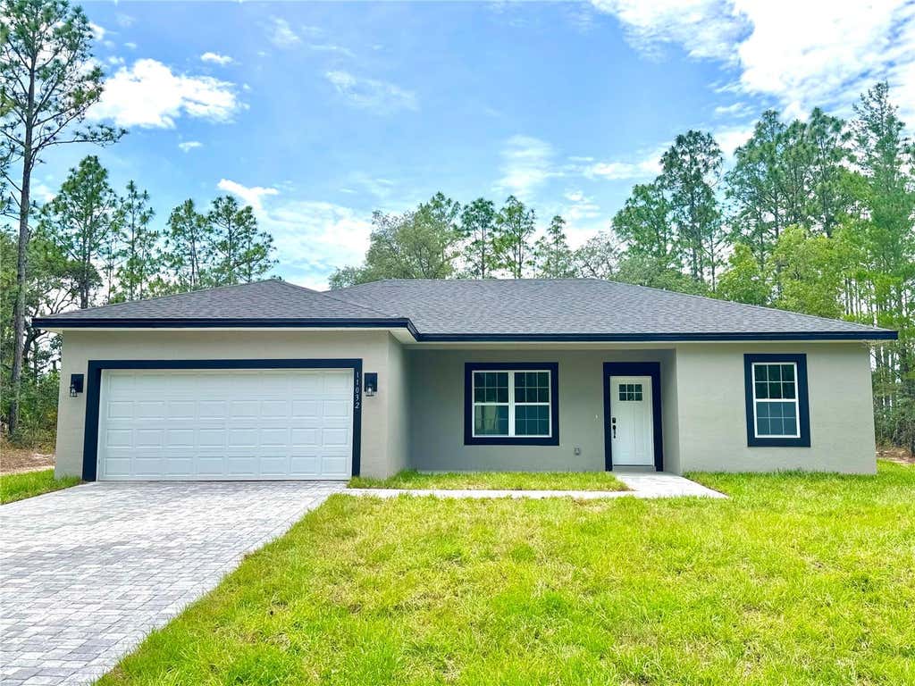 Photo of 11032 N Trigger Terrace, Citrus Springs, FL 34433 (MLS # O6410705)