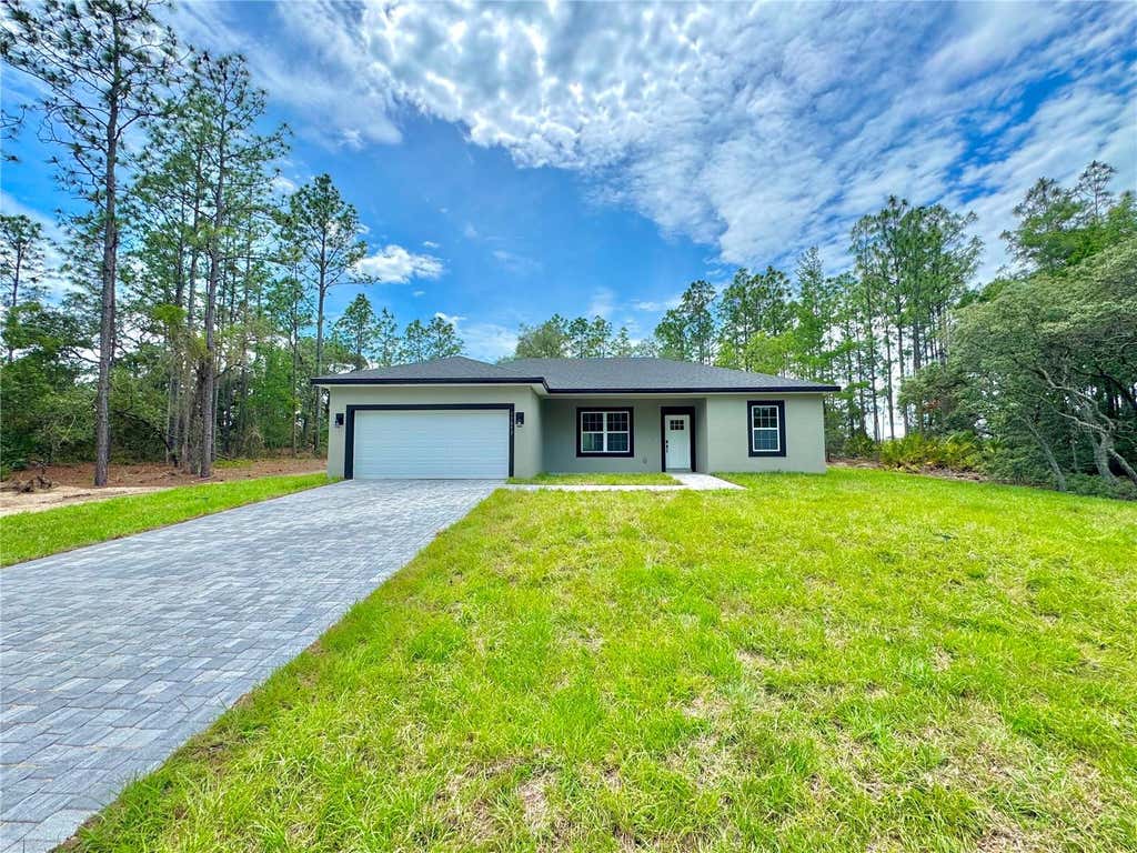 Photo of 11032 N Trigger Terrace, Citrus Springs, FL 34433 (MLS # O6410705)