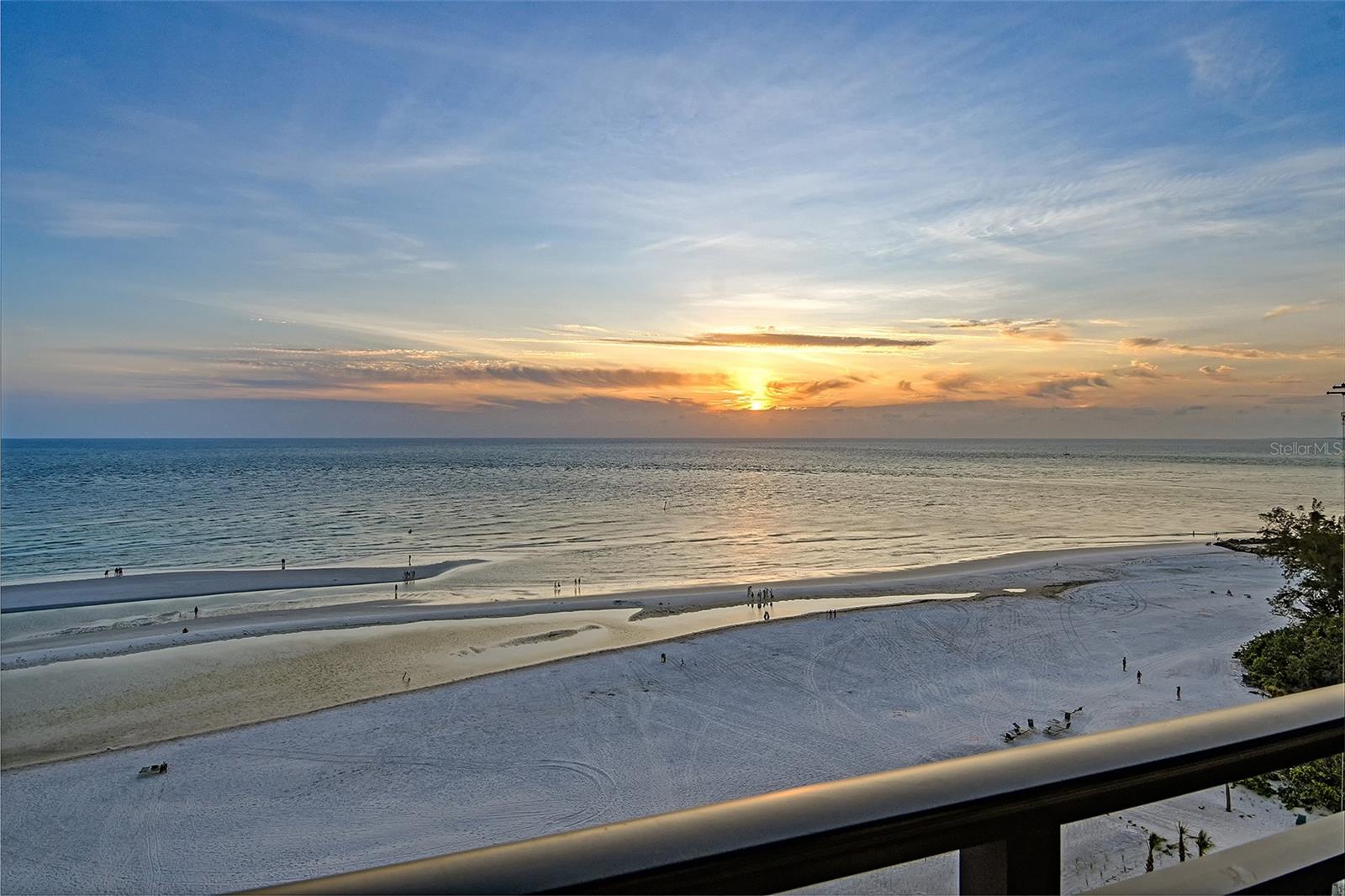 One or more photo(s) has been virtually staged. A truly RARE offering, this TOP floor, GULF FRONT PENTHOUSE residence crowns the northwest CORNER of the South Tower of Whispering Sands – the premiere 55+ Gulf front enclave on the idyllic westernmost point of Siesta Key where only a fortunate few enjoy world class, panoramic views of the sparkling Gulf and 800’ of PRIVATE quartz sand beach! FULL GULF views from this unit unfurl in every direction, offering a daily masterpiece of colors that shift with the rising and setting sun. Wake up to breathtaking Gulf views that seem to stretch to infinity, offering a tranquil retreat from the ordinary. In the evening, enjoy the golden hues of Florida sunsets and starlit dinners from your expansive 28’ balcony, where the Gulf breezes and soft cries of the seagulls serve as the perfect soundtrack. This penthouse is more than just a property – it’s also a canvas for your imagination. Distinctive architectural elements and premium untapped potential invite you to curate a space that reflects your own unique style and vision. Why inherit someone else’s style when you can create your own? Whether you envision modern sophistication, coastal charm, or timeless elegance, the untapped possibilities of this unit invite your imagination to run free as you create the ultimate sanctuary tailored to your personal vision. Whispering Sands' relaxed, informal lifestyle provides the perfect backdrop for your next chapter. Start your day with a set of vigorous laps or water aerobics in one of two beautiful, heated pools - one beachside, one clubside. You’ll never need to leave the property to get your gym workout in the main clubhouse currently undergoing a complete remodel. Plant your feet in the cool quartz sand and enjoy daily dips in the balmy Gulf. Beach loungers are set out daily for the exclusive use of owners. Enjoy an impromptu game of beachside shuffleboard followed by a picnic supper at the Tiki Hut. Whether spending time exploring the vibrant cultural offerings of Sarasota just across the North Bridge, indulging in the local arts scene, or simply relaxing on your breezy private balcony with a good book, the options this property offers are endless. Secure your private viewing of this unique residence and claim your place in this coveted coastal community.