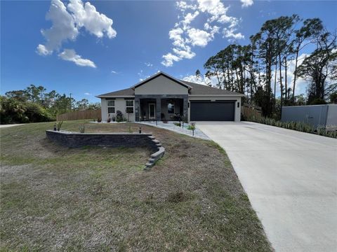 Photo of 2595 Hagoplan Lane, North Port, FL 34288 (MLS # O6410951)