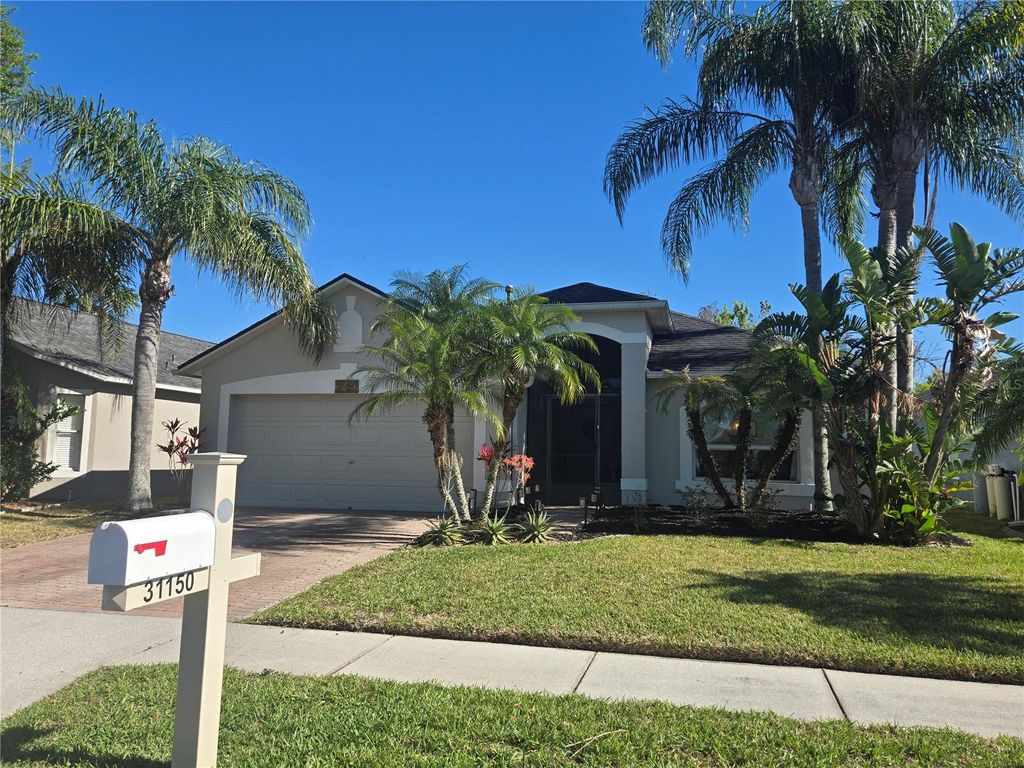 Photo of 31150 Harthorn Court, Wesley Chapel, FL 33543 (MLS # TB8363526)