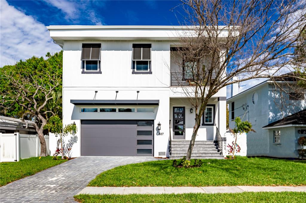 Under contract-accepting backup offers.Pre-Construction. To be built. Welcome to this beautifully designed new construction home located in Bayshore Beautiful. With a blend of transitional mix of modern & west indies touches this home is supplicating for you to call it yours! This 4 bedroom 4 bath home features with bonus room has an open floor plan where you can entertain all your house guests! It features a spacious bonus room on the second floor, 2 car garage, balcony, & a yard where you can spend time with your pup. Upon entering the home you will find double height ceilings in the foyer & your staircase taking you up to the second floor. As you enter into the main living area you will find an open concept living with a large kitchen that has plenty of cabinet space. On the first floor you will also find dining, living room, large guest bedroom & a full bath. As you head upstairs you will find a balcony, 18x11 bonus room, laundry, 2 additional bedrooms each with their own en-suite, & the owners retreat. The owners retreat boasts plenty of room, 2 walk-in closets, & an en suite bath with double vanities, soaking tub, & walk in shower. This home is located conveniently in South Tampa with close proximity to all that it has to offer. Call now & you can still pick finishes to customize this home to be yours!