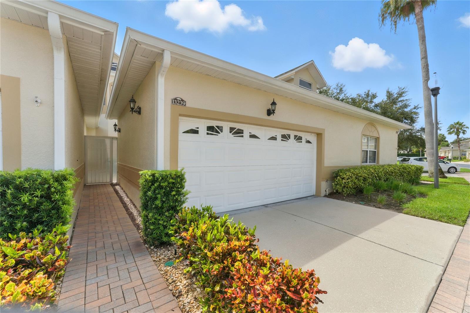 Welcome to Magnolia Pointe, a prestigious 24-hour guard-gated community ideally located near the Florida Turnpike in a rapidly growing area filled with new shopping, dining, and conveniences.
As you step through the private entry gate, you’re greeted by a charming courtyard—an inviting space that offers both privacy and the perfect spot to relax or gather with friends.
Inside, this beautifully maintained townhome shines with thoughtful updates and versatile living spaces. The main floor features stylish new luxury vinyl plank flooring, adding warmth and durability, while the upgraded black carpet on the stairs creates a sleek, modern touch. The kitchen flows seamlessly into an oversized great room, perfect for family living or entertaining guests. French doors extend the living space outdoors to a generous lanai, where you can enjoy Florida’s year-round sunshine.
Upstairs, the primary suite is exceptionally spacious and boasts a luxurious bath with an oversized walk-in shower, double vanities, and a large walk-in closet. Two additional bedrooms are also generously sized and share a full bath, making the second floor comfortable and functional for family or guests.
The home also includes a first-floor laundry room with both washer and dryer included. All exterior landscaping is maintained by the HOA for easy living.
Magnolia Pointe sits along the shores of John’s Lake and offers an incredible lineup of amenities: a private boat ramp, fishing pier, tennis and basketball courts, community pool, playground, clubhouse, and fitness center.
This move-in ready home combines modern updates, spacious design, and resort-style community features—truly the best of Florida living. Schedule your tour today and come see why Magnolia Pointe is the perfect place to call home!