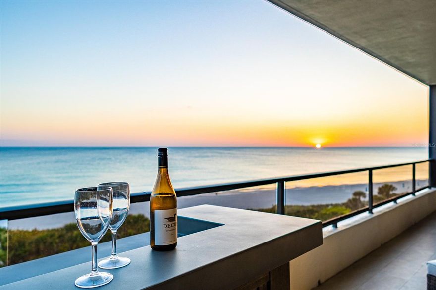 Soaring views of the azure Gulf waters and Downtown Sarasota are enjoyed from this southwest facing corner residence at The Sanctuary on south Longboat Key. The finest appointments have been carefully chosen throughout this completely renovated 3 bedroom masterpiece with custom floor plan. The great room combines a comfortable den area for family gatherings complete with a chic wet bar and surrounded by walls of impact glass sliders accessing the massive wraparound terrace. Prepare for competition when it comes to meal prepping! Home chefs will be soon be spoiled when using top of the line Thermador appliances with the custom built-in oven perfectly positioned in the island facing the white sand beach and crystalline waters. The primary suite was thoughtfully separated in the renovation from the two guestrooms and is accessed through a grand double door entry. Owners are pampered with big turquoise water views and are lulled to sleep using the nature’s ultimate sound machine of waves in the background. The designer washroom offers dual vanities, a large walk-in closet, separate make-up vanity station and glass enclosed shower with multiple jets and rain showerhead. The two guest bedrooms share a bathroom, which rivals the primary suite and guests in both rooms will enjoy partial water views and big Downtown Sarasota city skyline views to the east. At the Sanctuary, you will be part of 18 incredible beachfront acres with trails, an Olympic sized heated pool and spa, lighted tennis courts, a fitness center, and a clubhouse with planned activities. Become a member of the Longboat Key Club and partake in the superior golf courses, 6 private restaurants, spa and wellness center and other AAA four-diamond beach resort offerings. Conveniently located on south Longboat Key close to St. Armands and the cultural hub of downtown Sarasota.